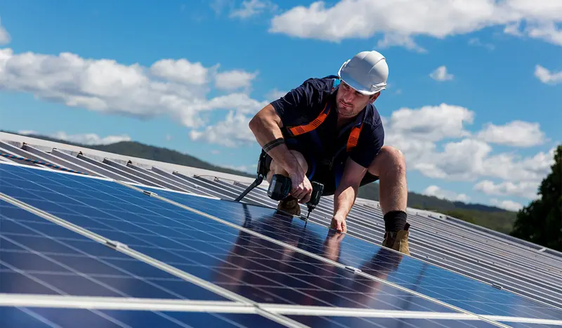 A Council Home Energy Program installer at work