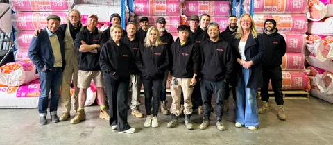 The EnviroFlex team, in their warehouse